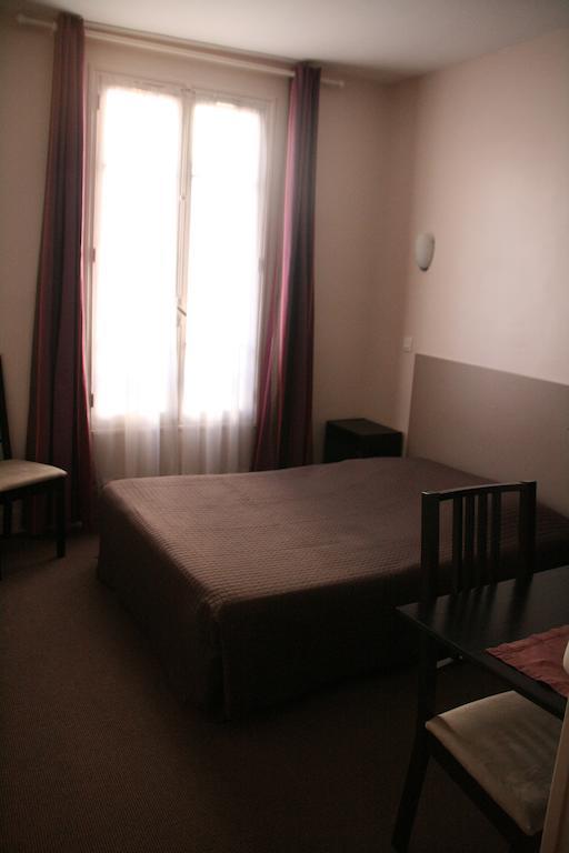 Hotel Du Roussillon Paris Phòng bức ảnh
